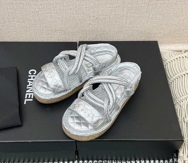 Chanel slippers silver in raffia